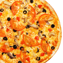 Whole pizza with tomatos